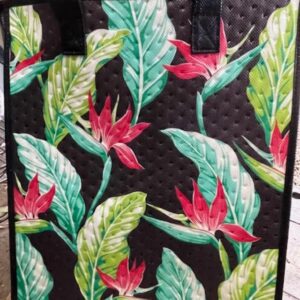 large colorful bag with bird of paradise and tropical leaf design